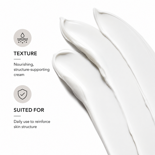 White cream texture swatch representing Revision Skincare D·E·J Face Cream, a comprehensive moisturizer that helps support firmer, healthier-looking skin